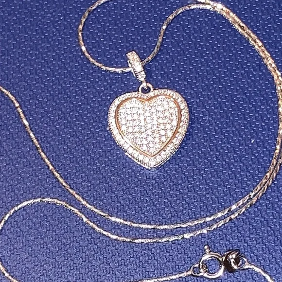 New 1/10 carat paved diamond necklace in sterling silver